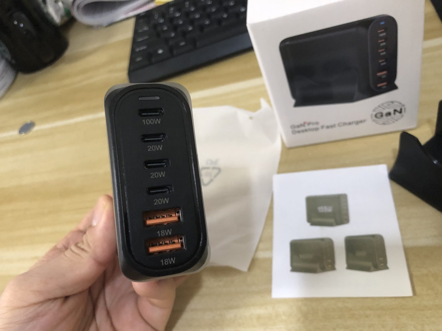 Close-up of USB-C and USB-A ports on a 200W desktop GaN charger sample